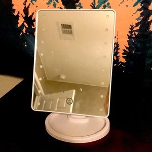 Adjustable light up mirror
